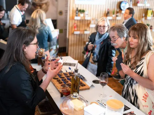 Visitors interacting at an EU food exhibition in the US